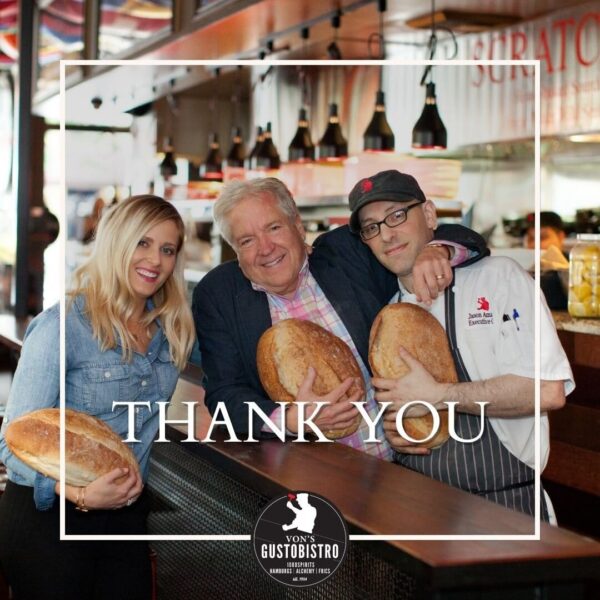 Thank you graphic with smiling business owners and Chef