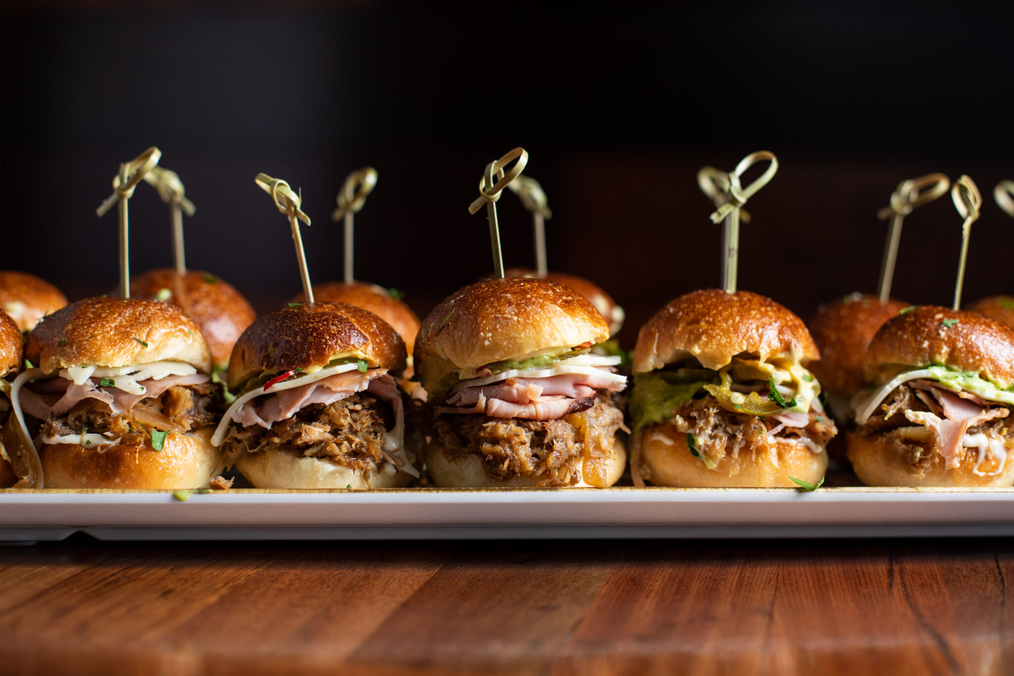 Cuban sliders on sourdough buns with pulled pork, ham, and pickles