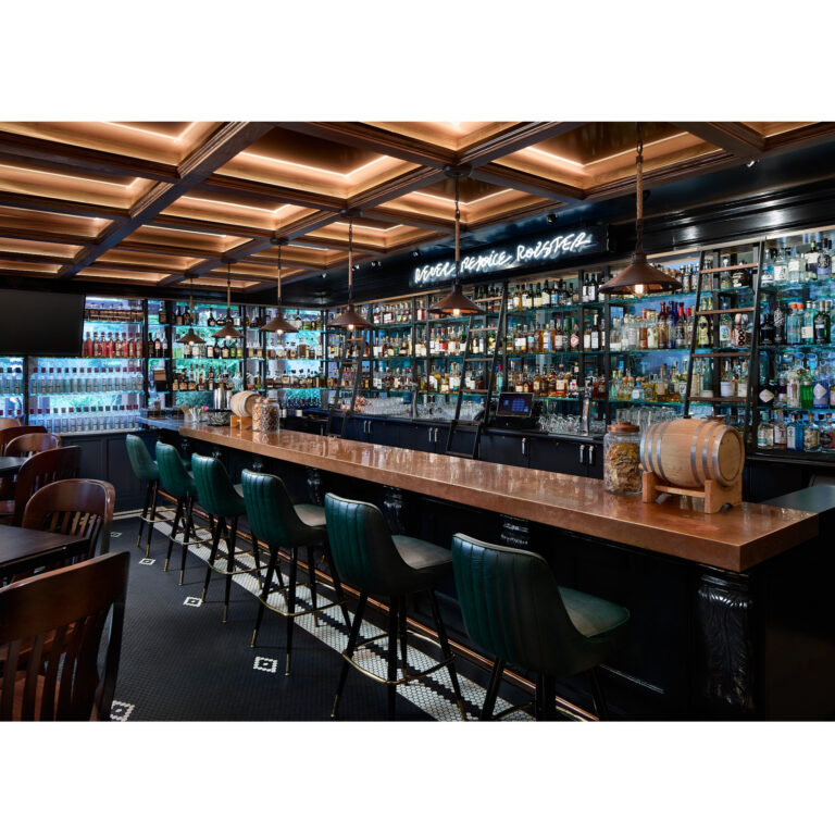 Von’s 1000Spirits bar in Woodinville with backlit spirits wall and marble bar top